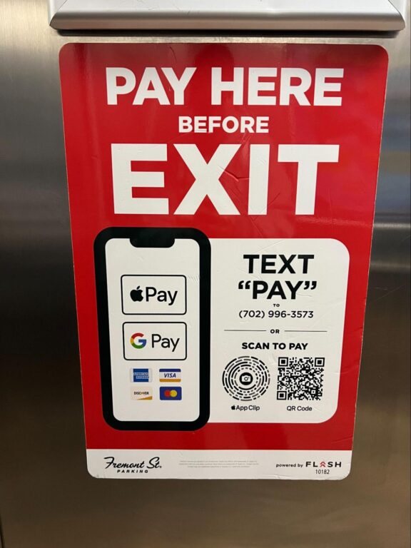 Pay here before exit sign