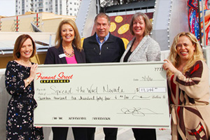 Spread the Word Nevada Receives $17,244 Donation from Fremont Street Experience
