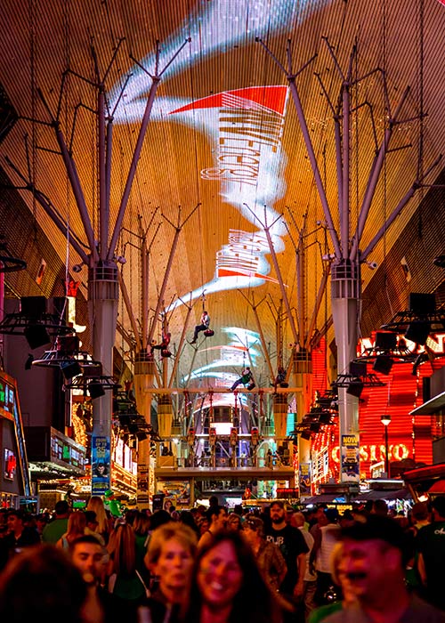 Crowd of people under Viva Vision Screen in Downtown Las Vegas