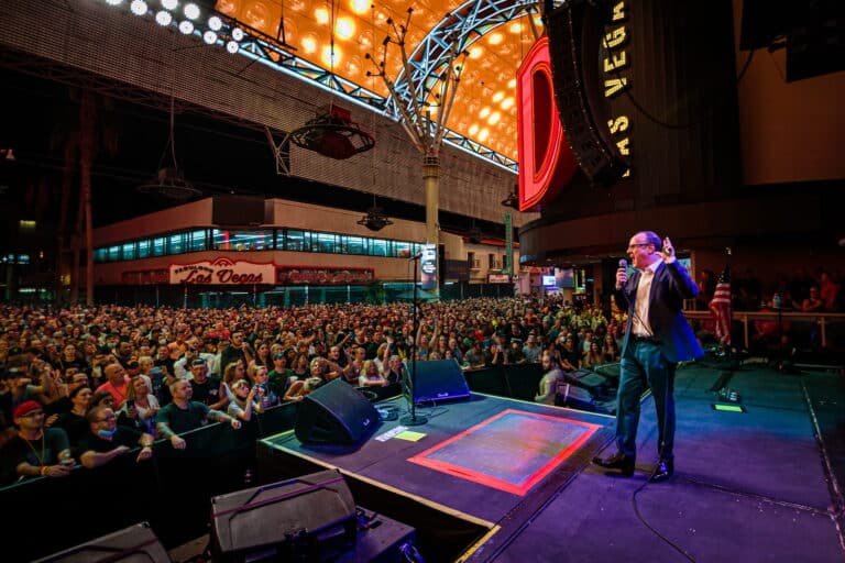 The slotzilla zipline cords hang above a full crowd at a downtown rocks concert.