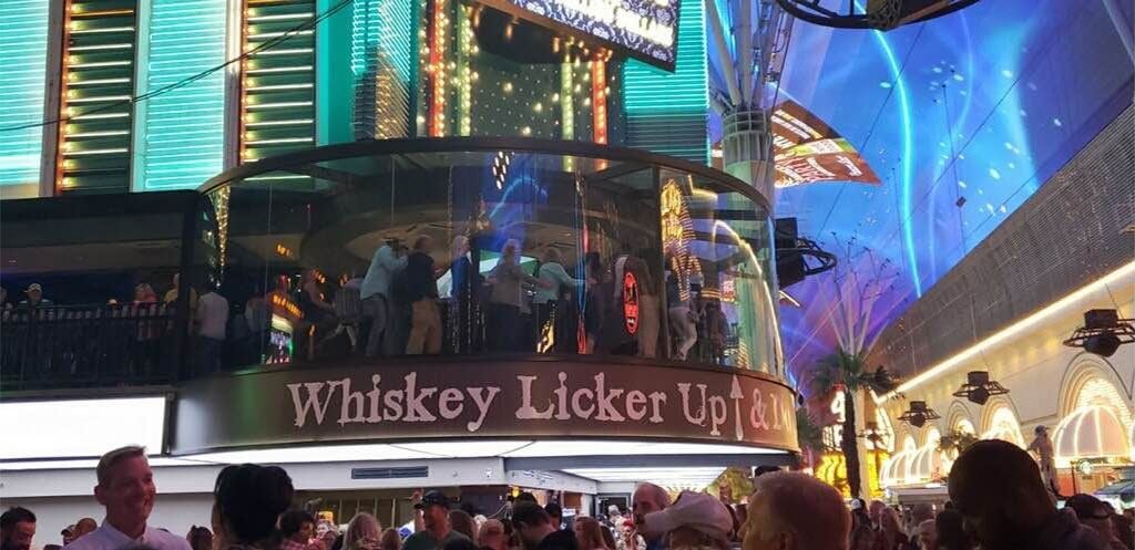 A view of the rotating bar at Whiskey Licker Up from the outside. Inside, the patrons are doing a Conga line.