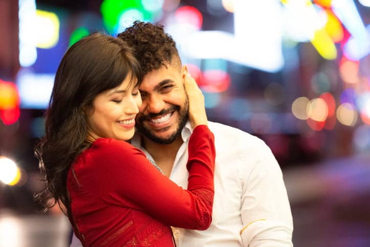 Two people embracing after a proposal in Las Vegas.